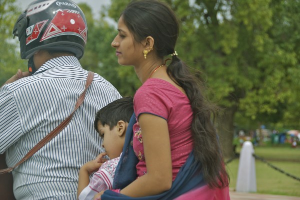 women of india - family on motorcycle
