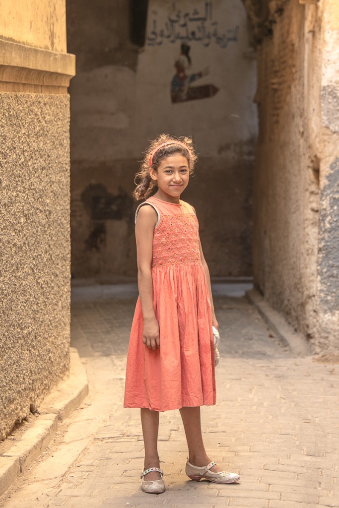 a child in the medina of fez, morocco